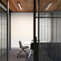 An Office with slats covering the perimeter.