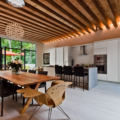 Dining Room and Kitchen with Wooden Slat panneling that helps with noise levels