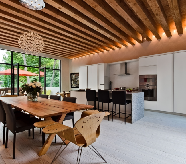 Dining Room and Kitchen with Wooden Slat panneling that helps with noise levels