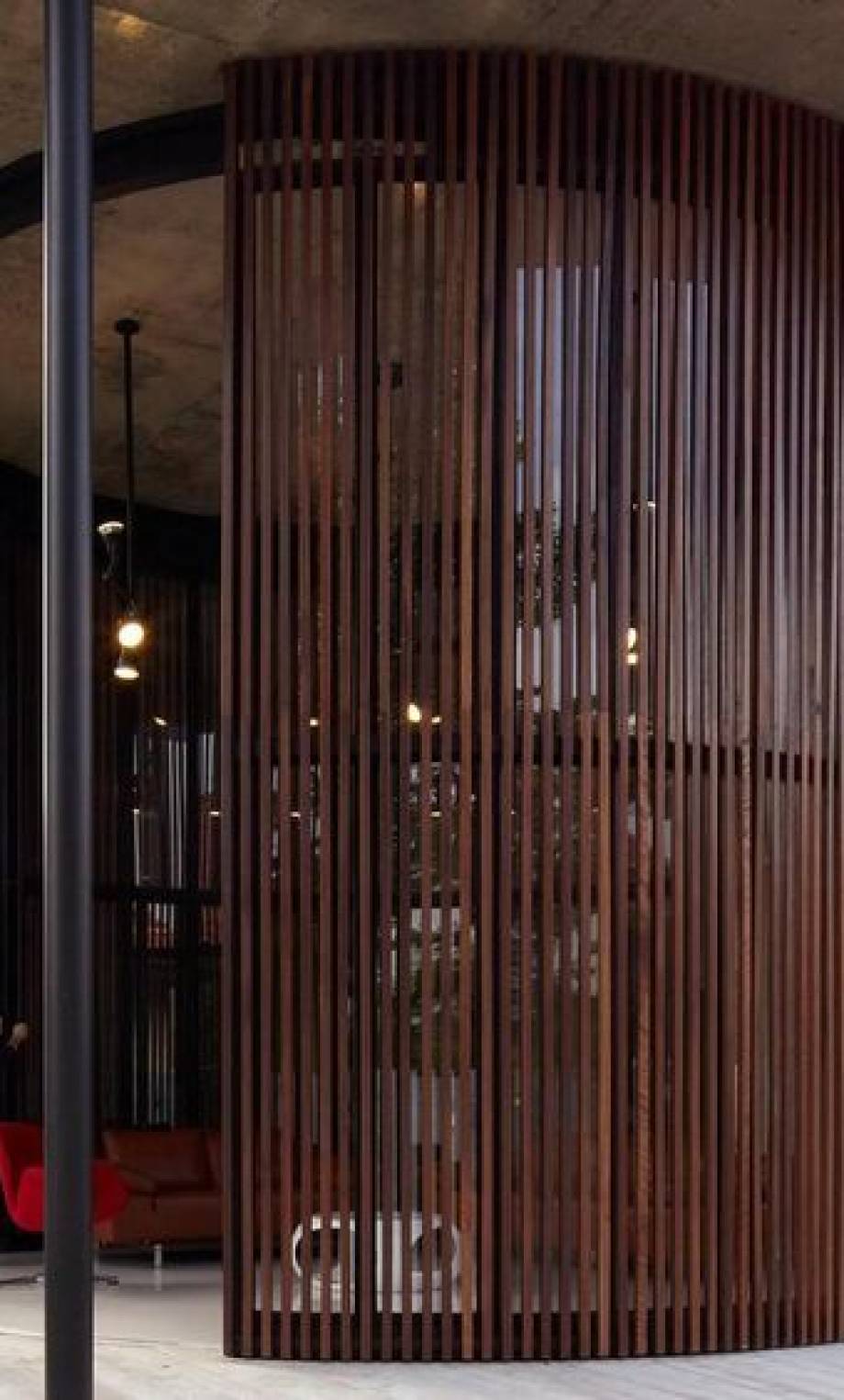 A wall of wooden slats on a track